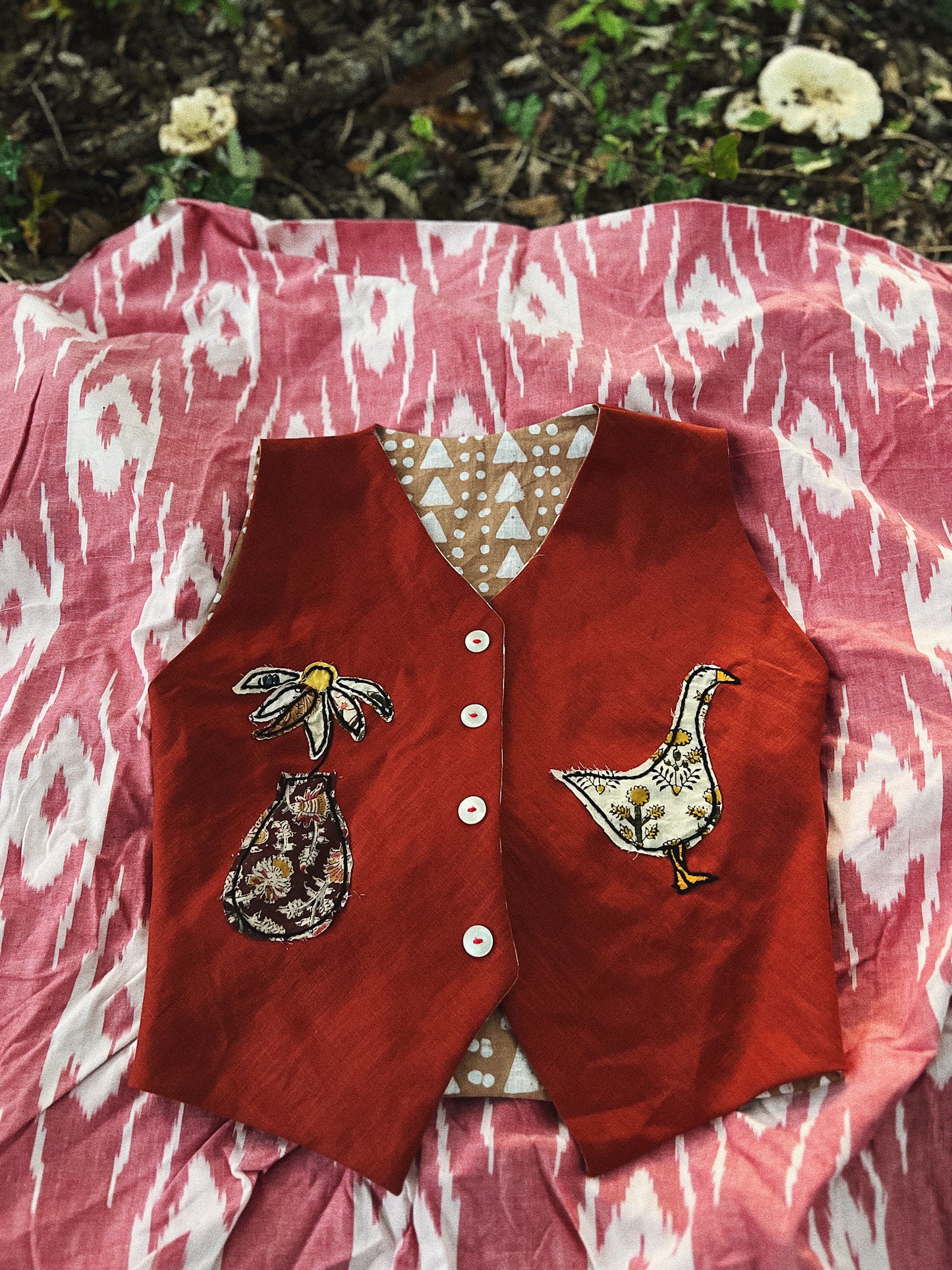 One piece embroidered vest size XS/S