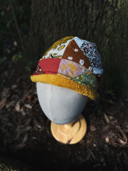 Quilted block printed cotton and fleece beanie hat